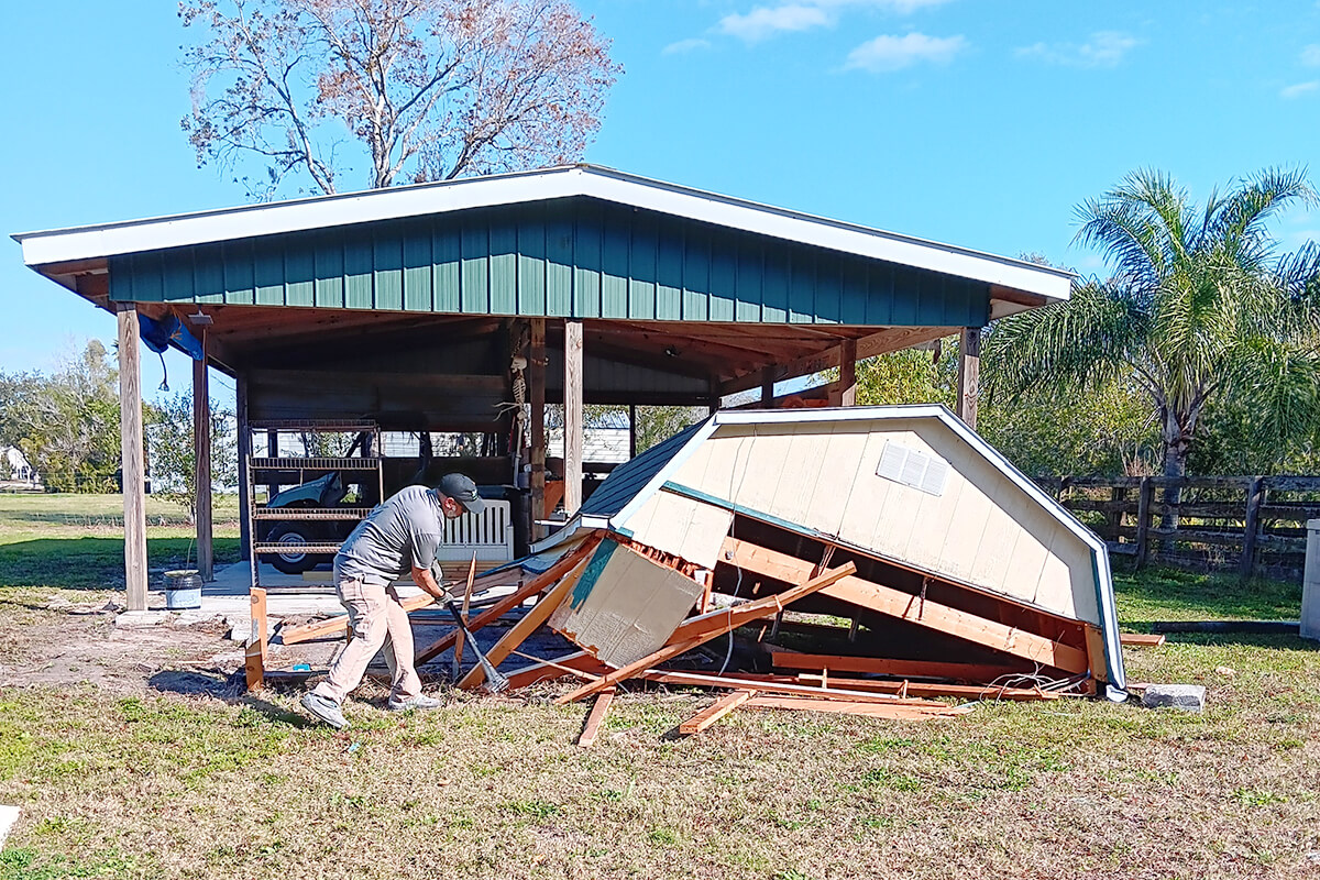 Jose Removing Demolished Truss