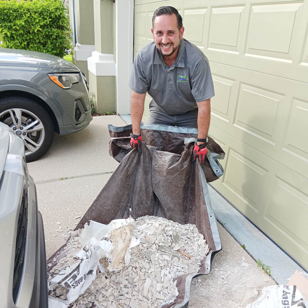 Out With the Old, In with the New: Start Spring 2025 Fresh with a Junk-Free Home 7 Smiling Ronel Removing Debris