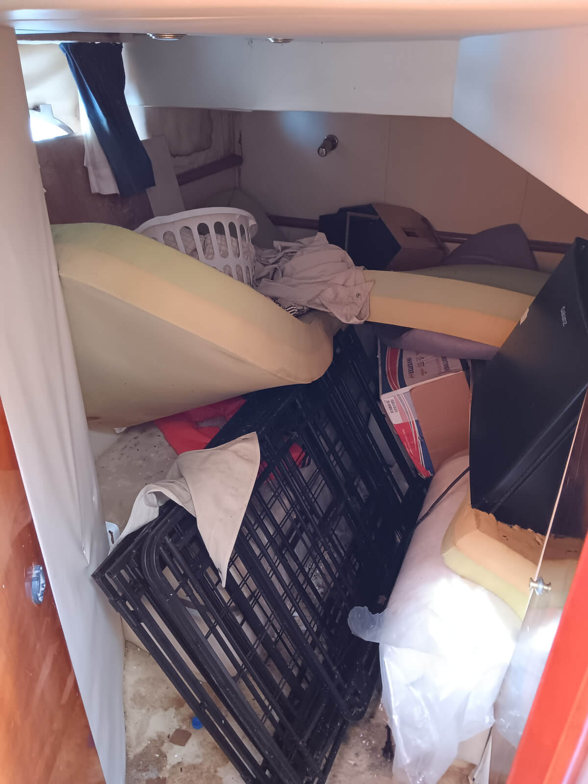 the inside of a boat with a lot of clutter