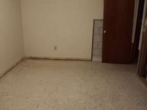 Empty Brandon bedroom with bare floors after cleanout