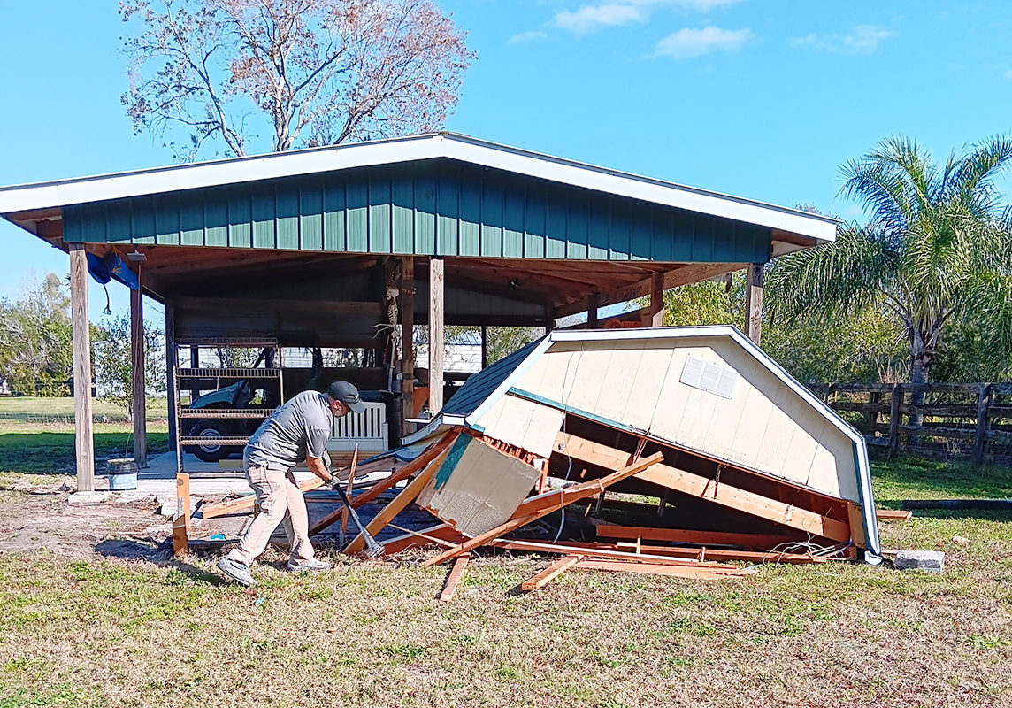 Jose Removing Demolished Truss
